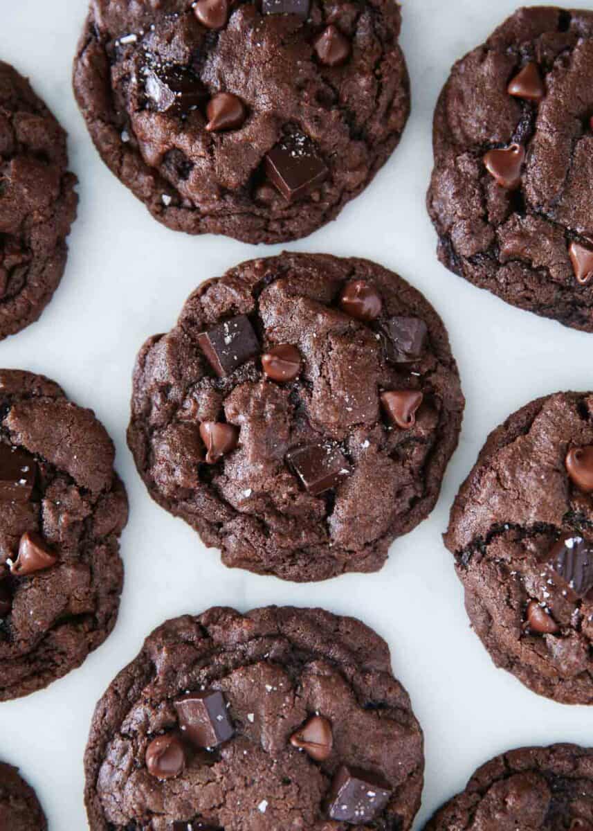 Triple chocolate chip cookies on counter.