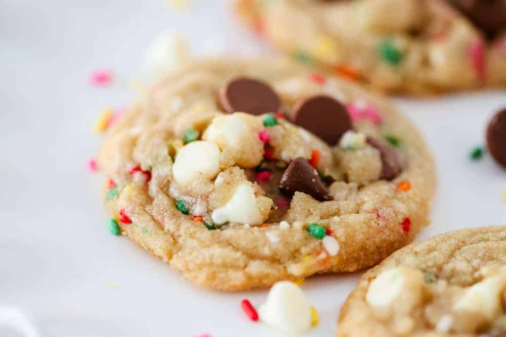 Chocolate chip cookie with sprinkles.