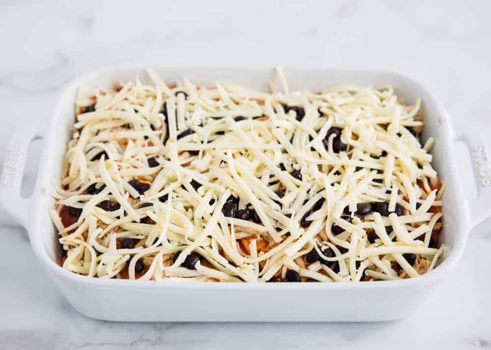 Chicken enchilada casserole with cheese.