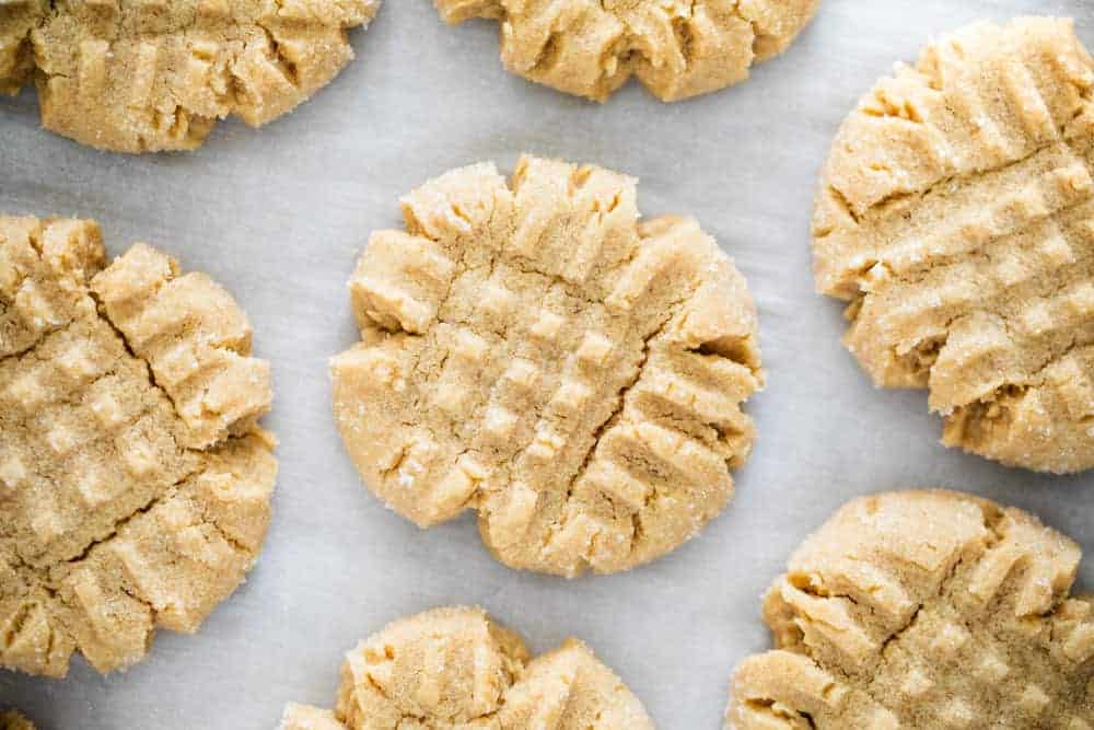 Easy peanut butter cookies made with only 3 ingredients in just 15 minutes. These cookies are soft, chewy and full of creamy peanut butter flavor. 3 ingredient peanut butter cookies.