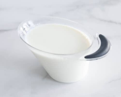milk in measuring cup