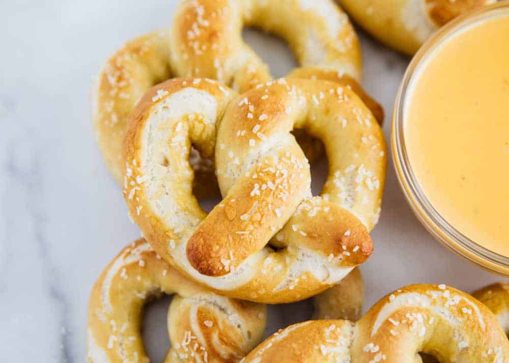 Soft pretzels with cheese sauce.