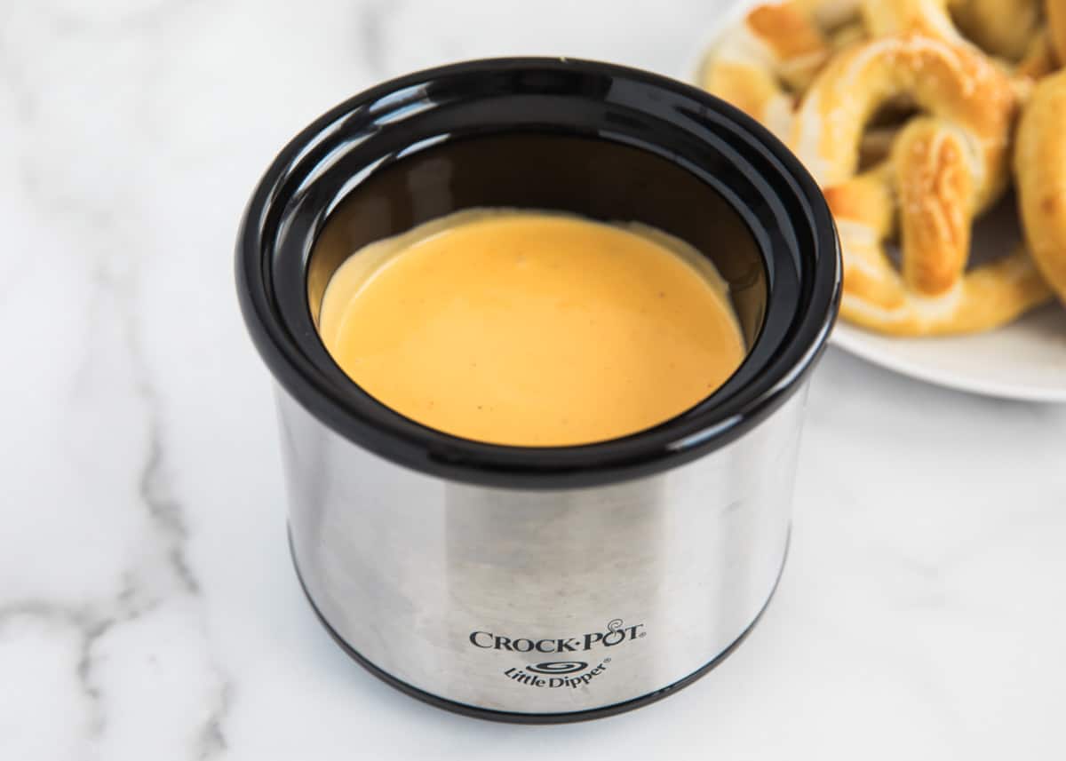 Cheese sauce in a small crockpot. 