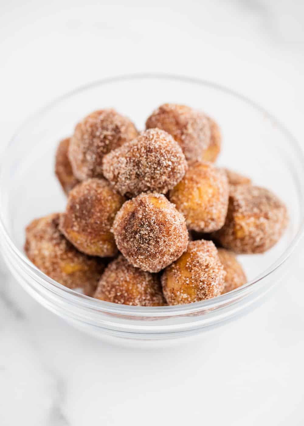 Cinnamon sugar pretzel bites in bowl.