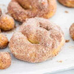 cinnamon sugar pretzels on parchment paper