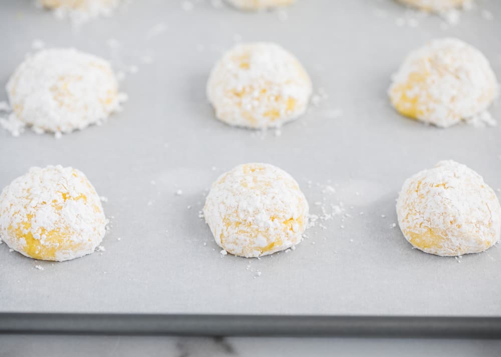 Lemon cake mix cookies ready to bake on pan.