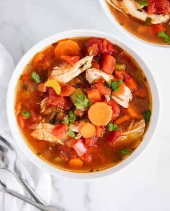 Mexican chicken soup in white bowl