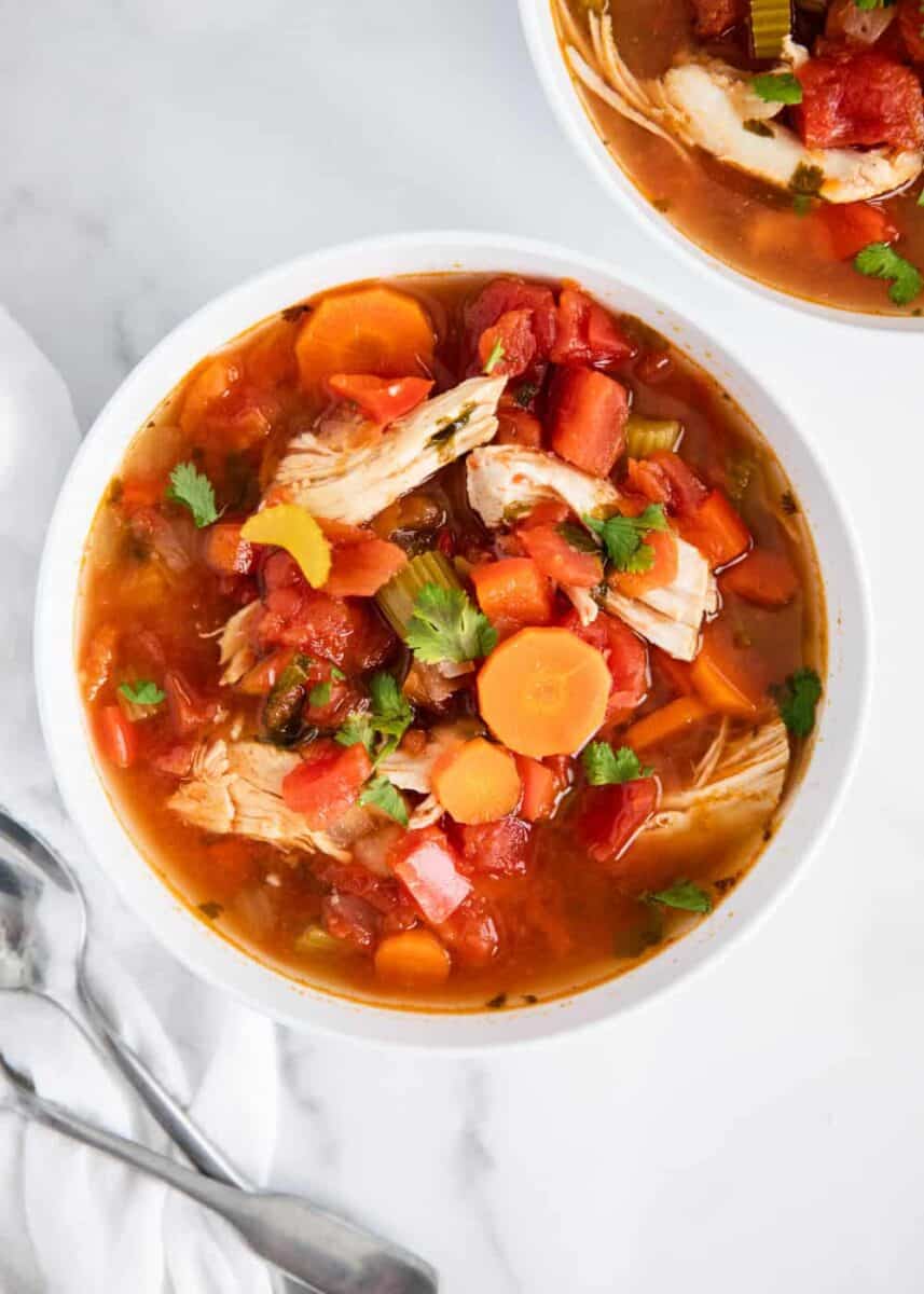Mexican chicken soup in white bowl