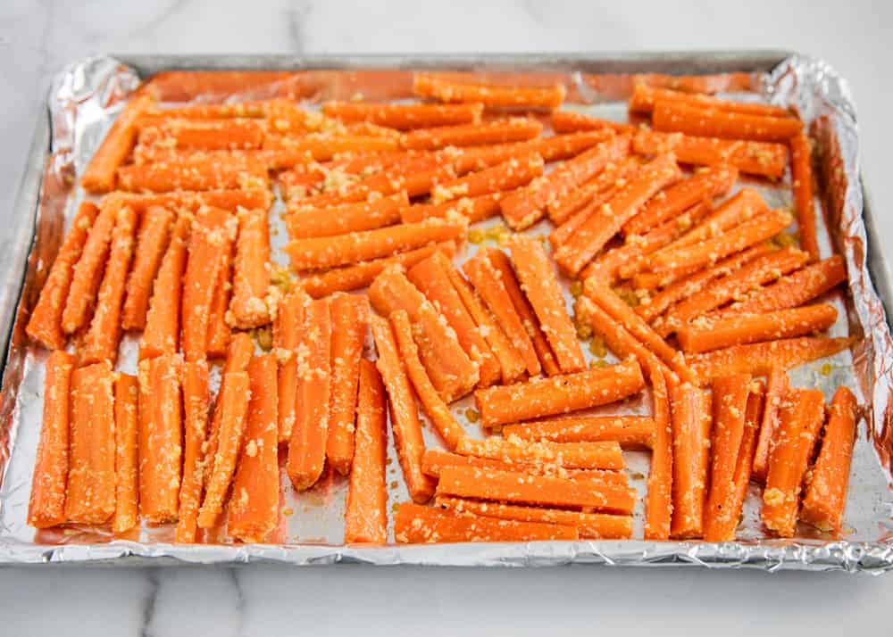 Parmesan garlic carrots on pan.