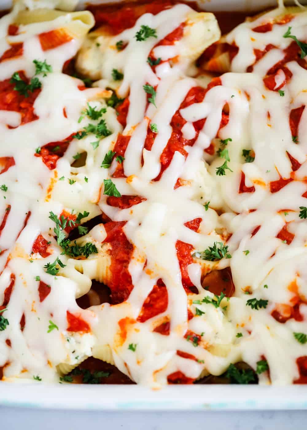 Ricotta stuffed shells in pan.