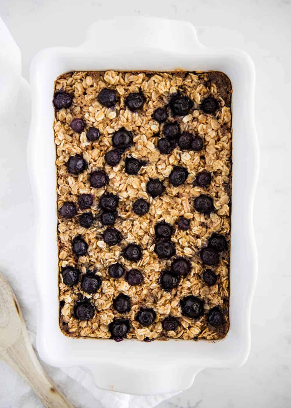 Blueberry baked oatmeal in white pan.