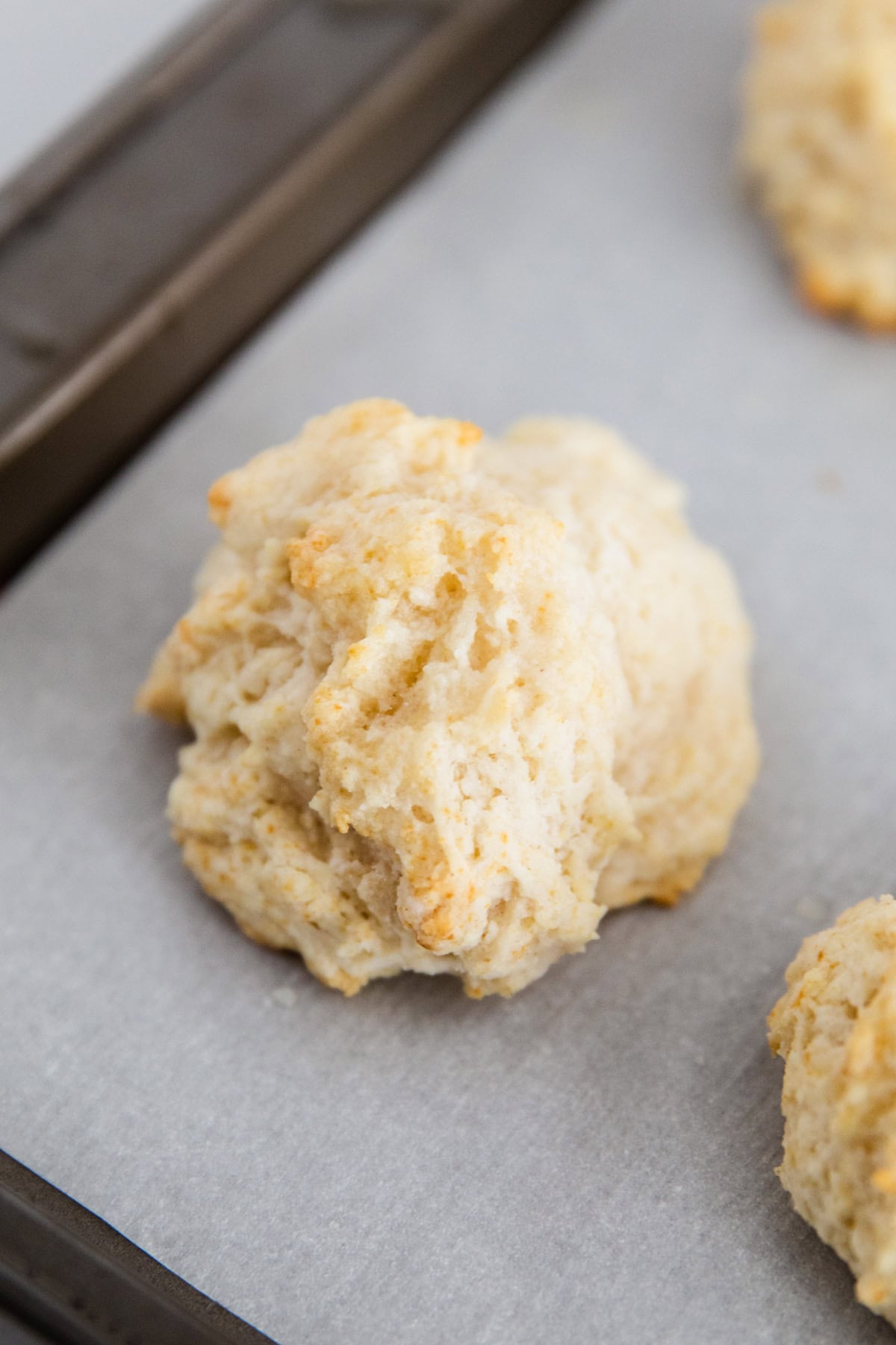 Drop biscuits on a parchment lined baking pan.