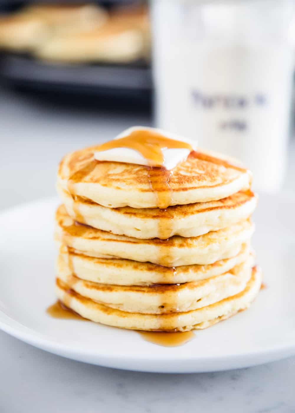 Pancakes on white plate.