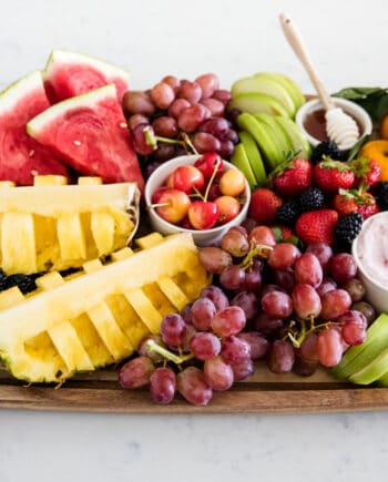 fresh fruit platter on wood board