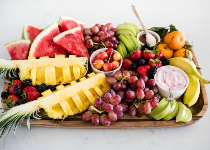 fresh fruit platter on wood board
