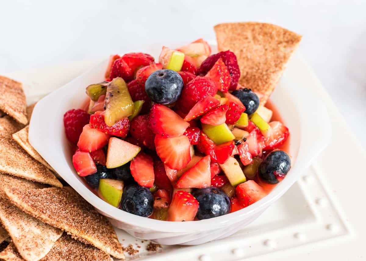 Fruit salsa in white bowl.