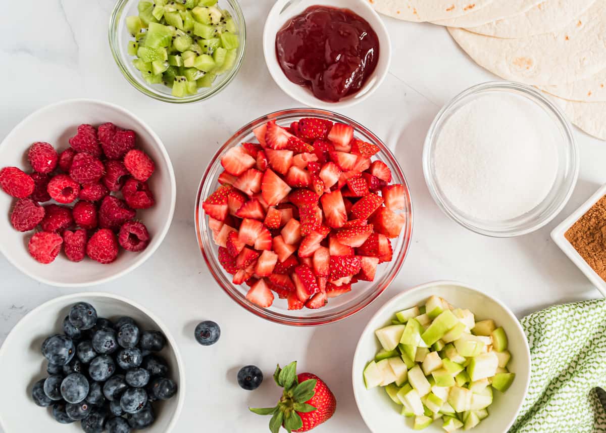 Fruit salsa ingredients on counter.