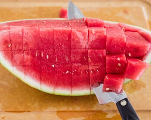 cutting watermelon into cubes