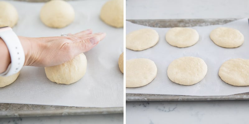 Flattening dough on a pan with the palm of hands.