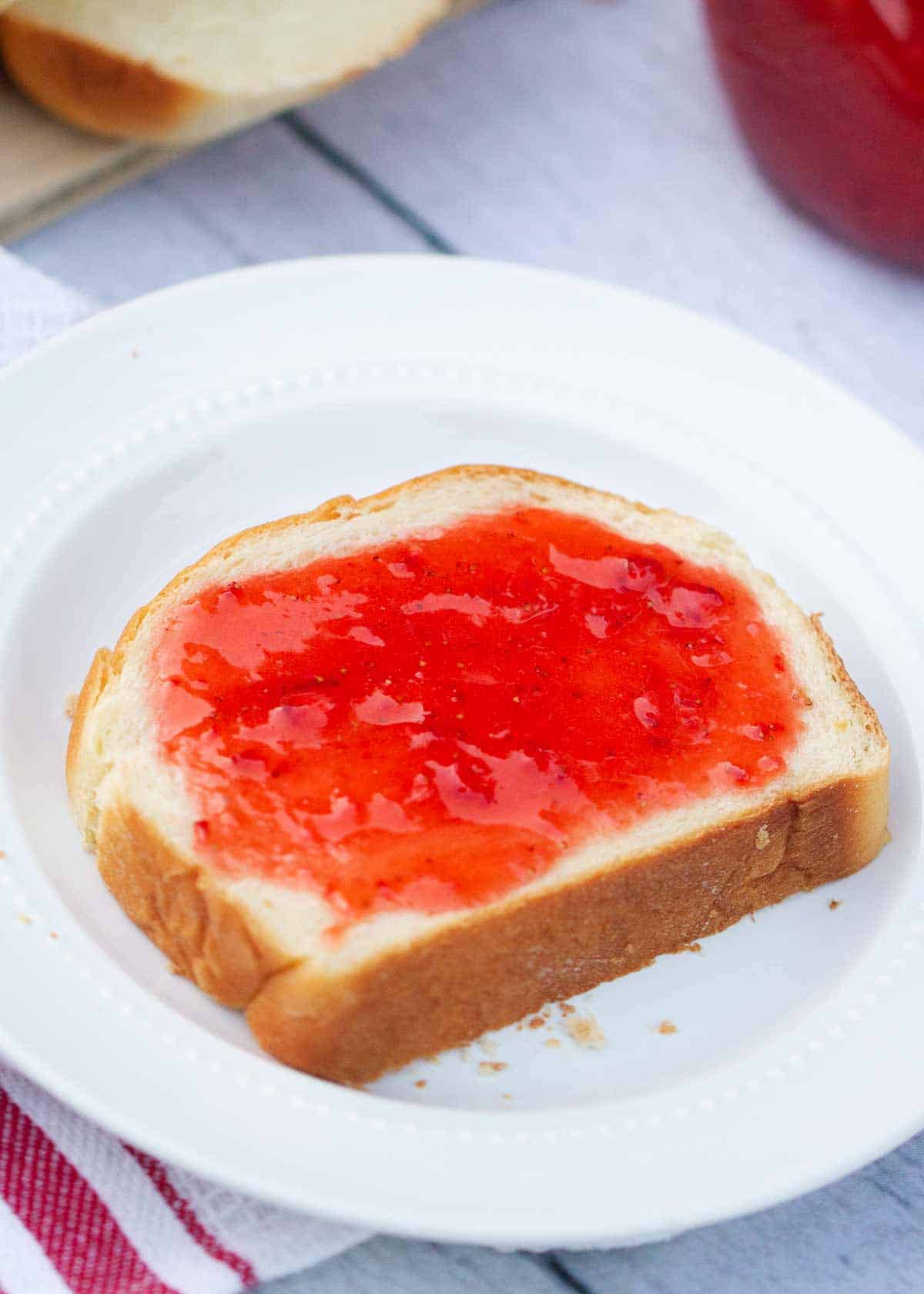 Strawberry jam on homemade bread.