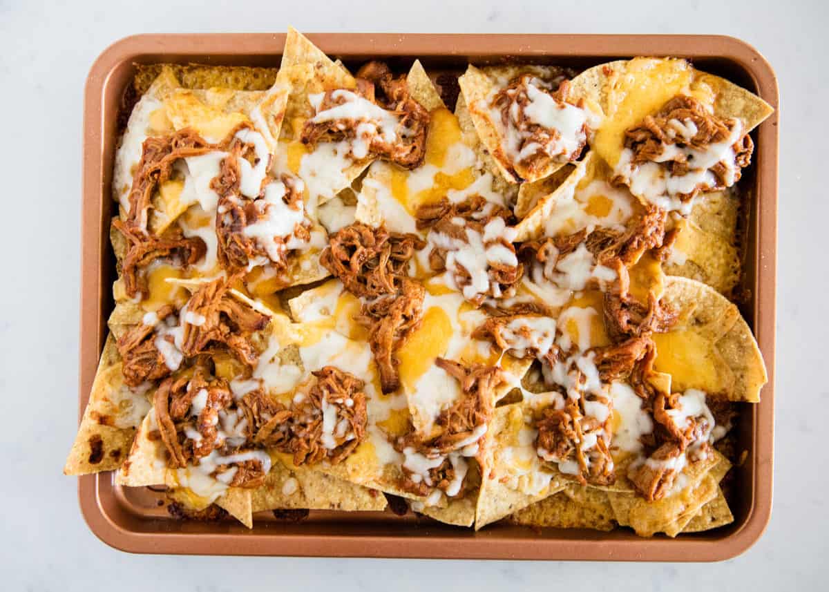 Bbq pork nachos on pan.