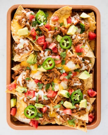 bbq pork nachos on pan