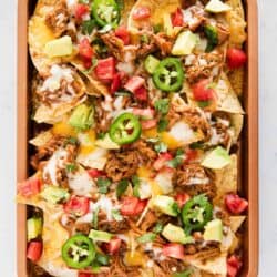 bbq pork nachos on pan