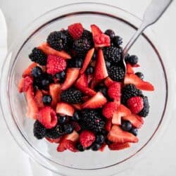 berry fruit salad in glass bowl