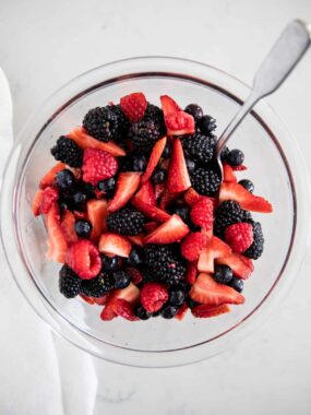 berry fruit salad in glass bowl