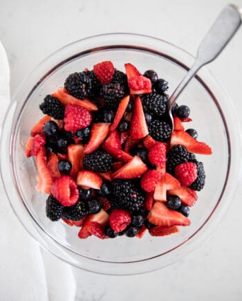 berry fruit salad in glass bowl