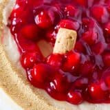 cherry cheesecake dip in glass pie dish