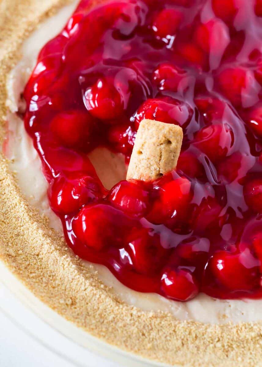 cherry cheesecake dip in glass pie dish
