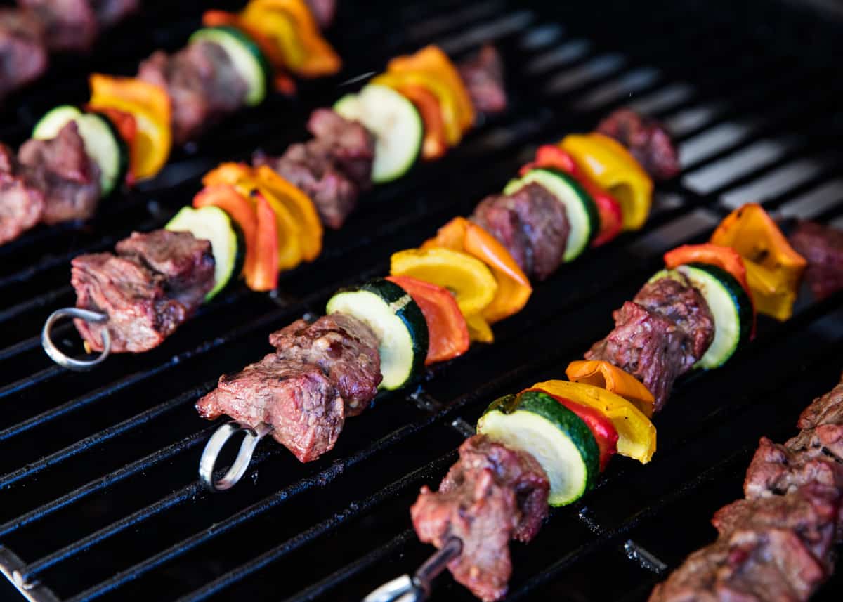 Steak kabobs on the grill.
