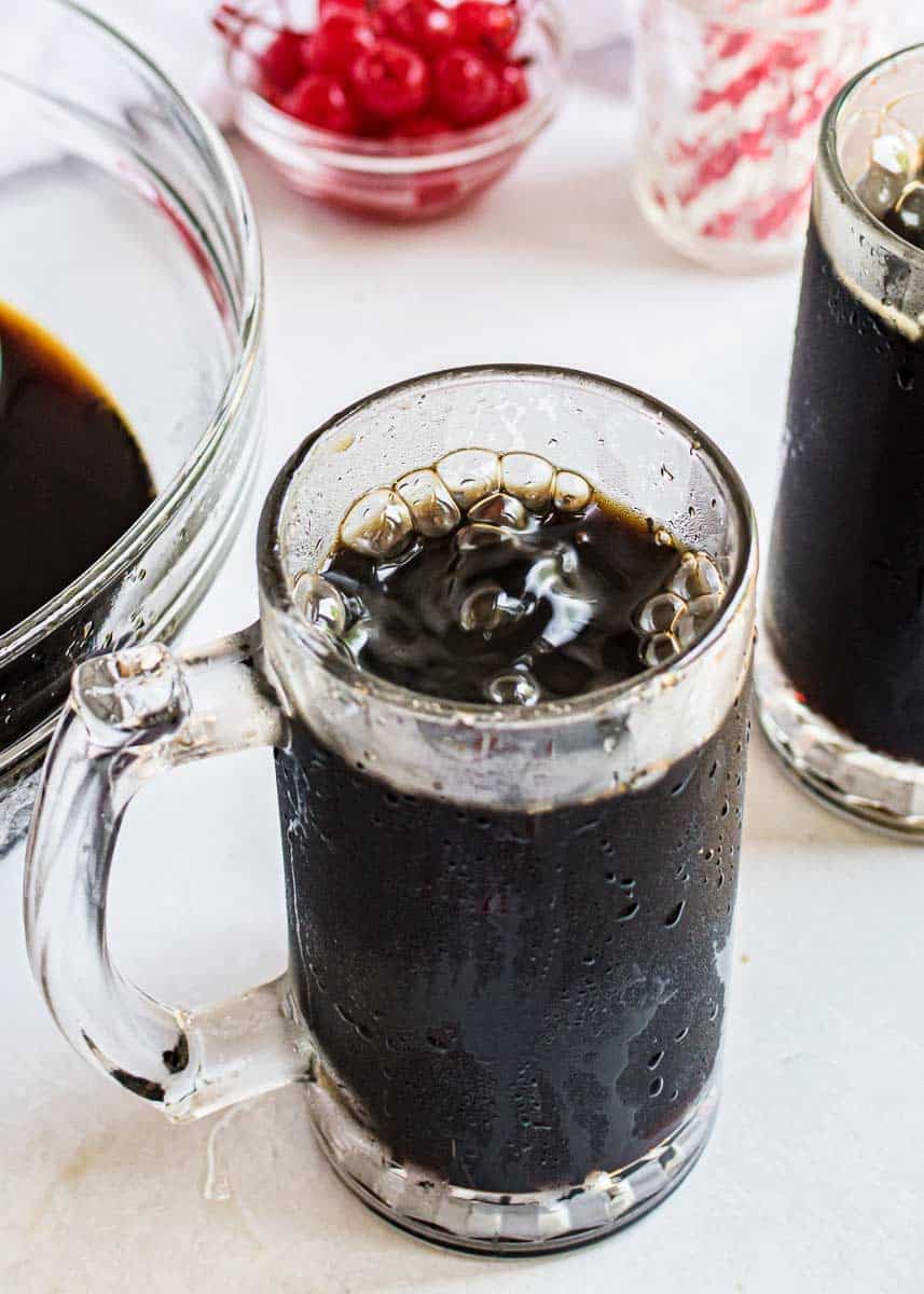 Homemade root beer in glass.