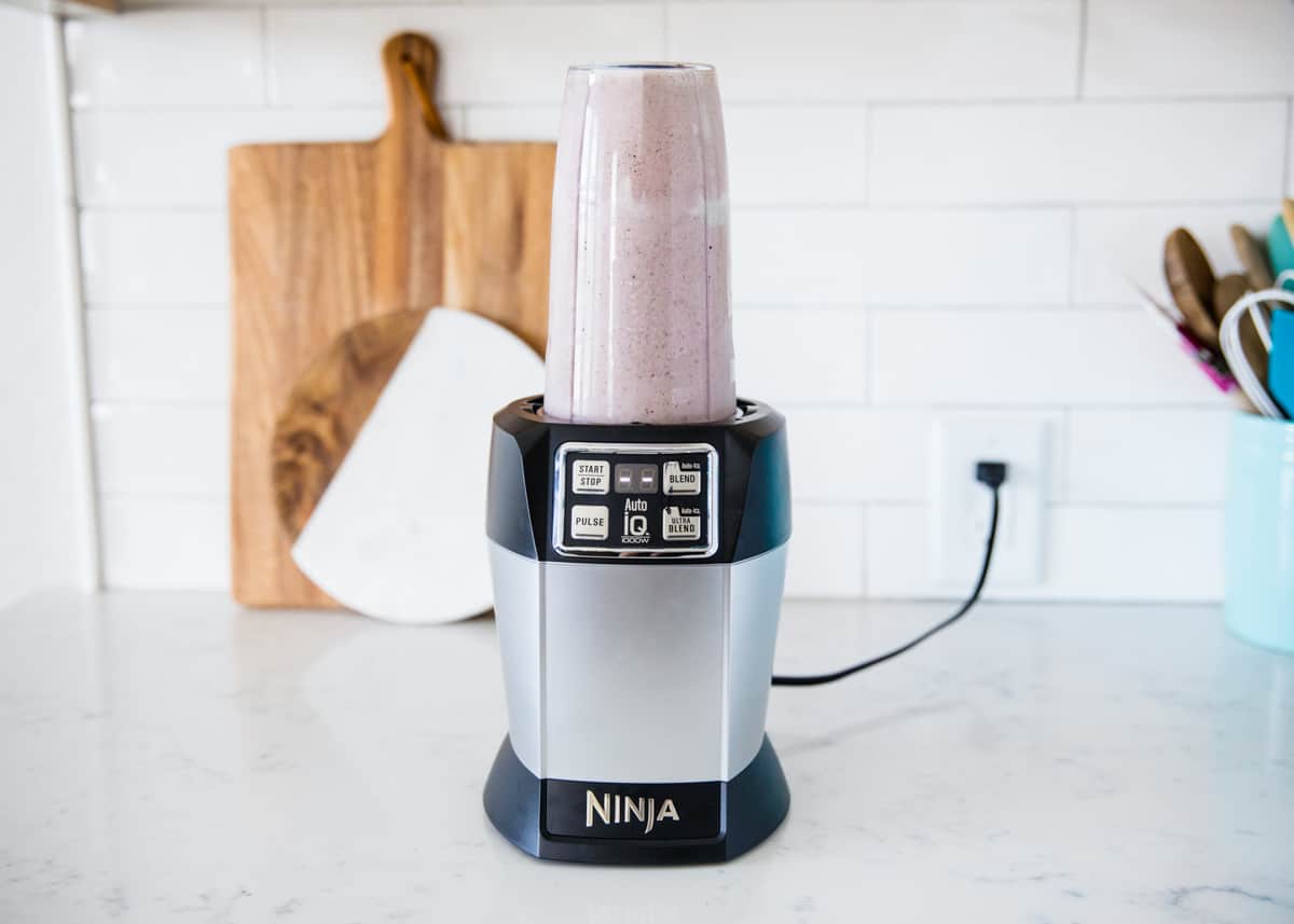 Making single serve smoothie in Ninja blender.