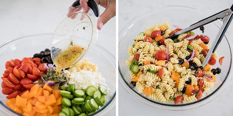 Pouring dressing over greek pasta salad.