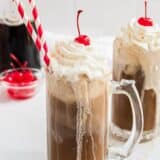 root beer float with red straw and cherry on top