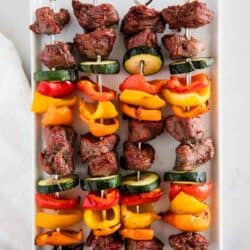 steak kabobs on white plate