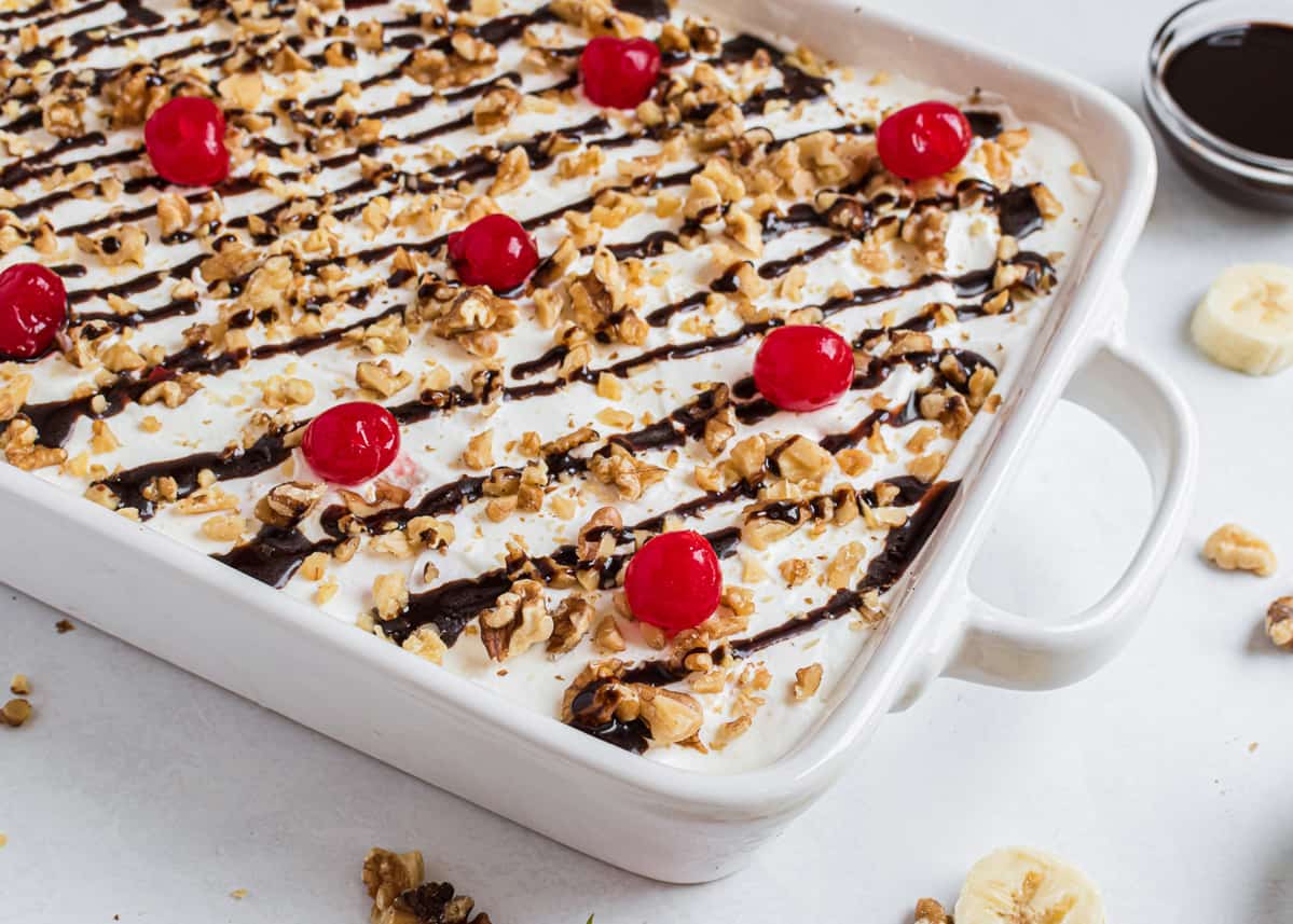 Banana split dessert in cake pan.