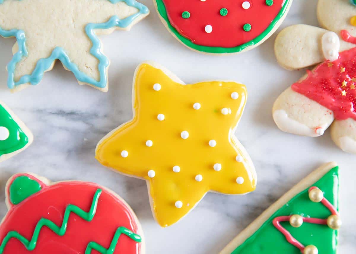 Iced christmas sugar cookies on counter