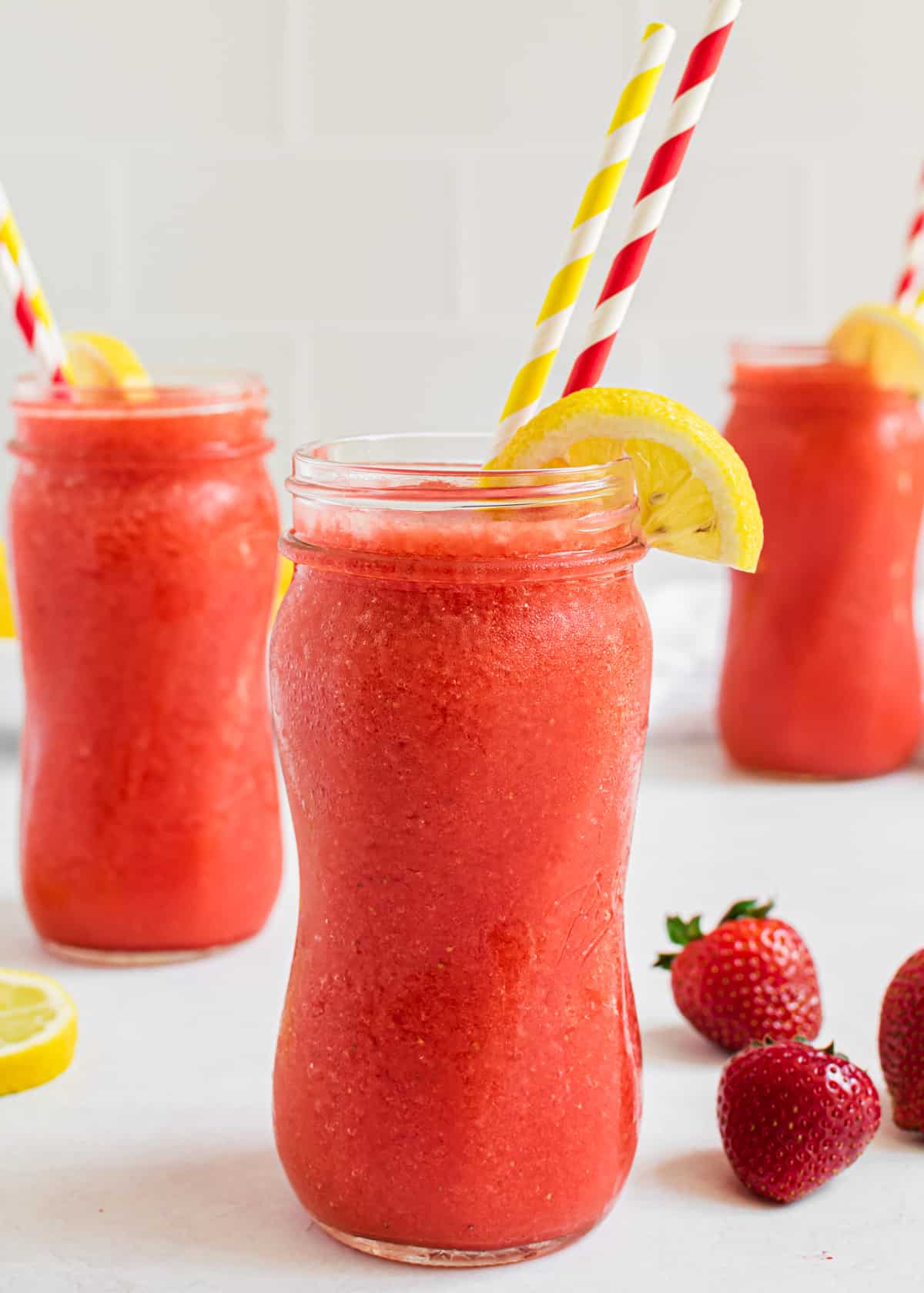 Frozen strawberry lemonade in glasses.