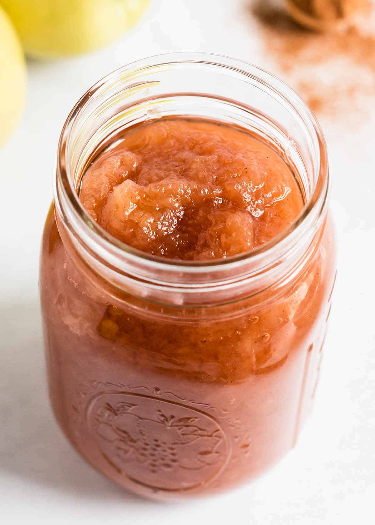 Jar full of applesauce.