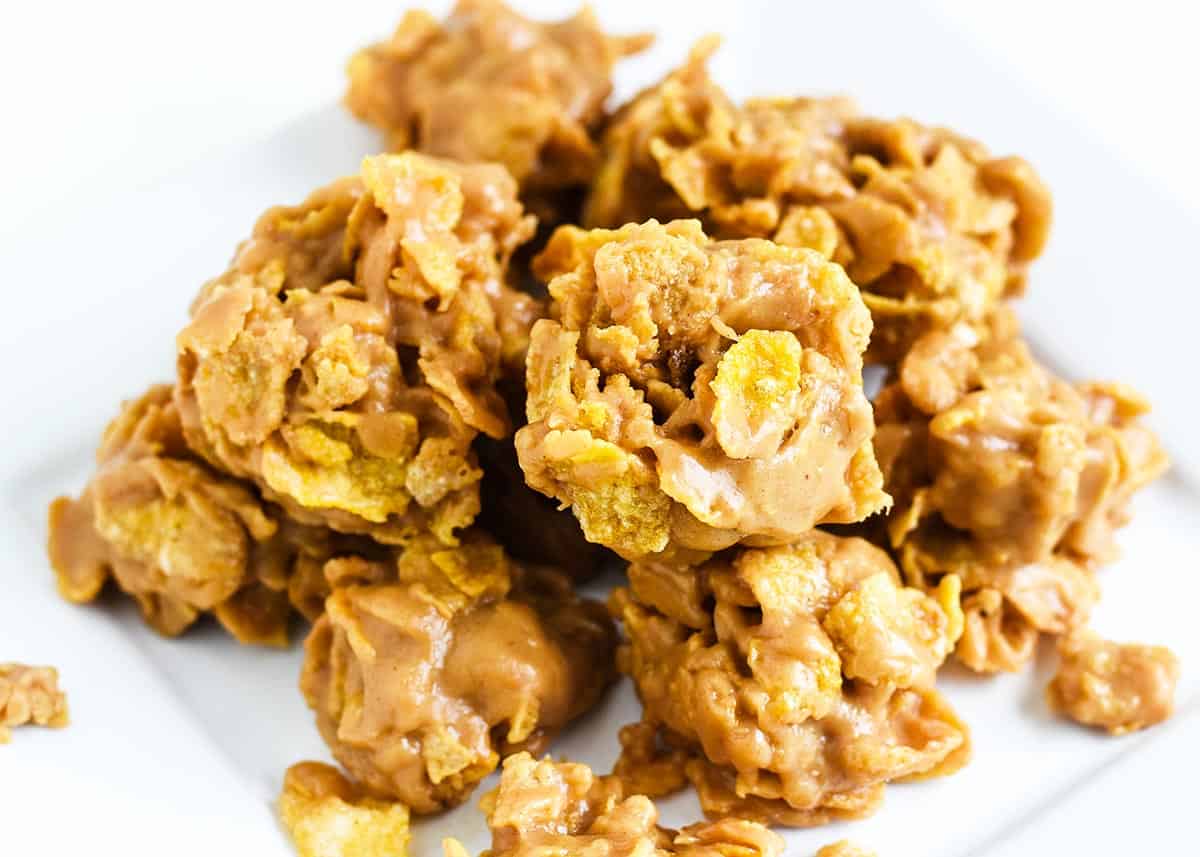 Cornflake cookies on white plate.