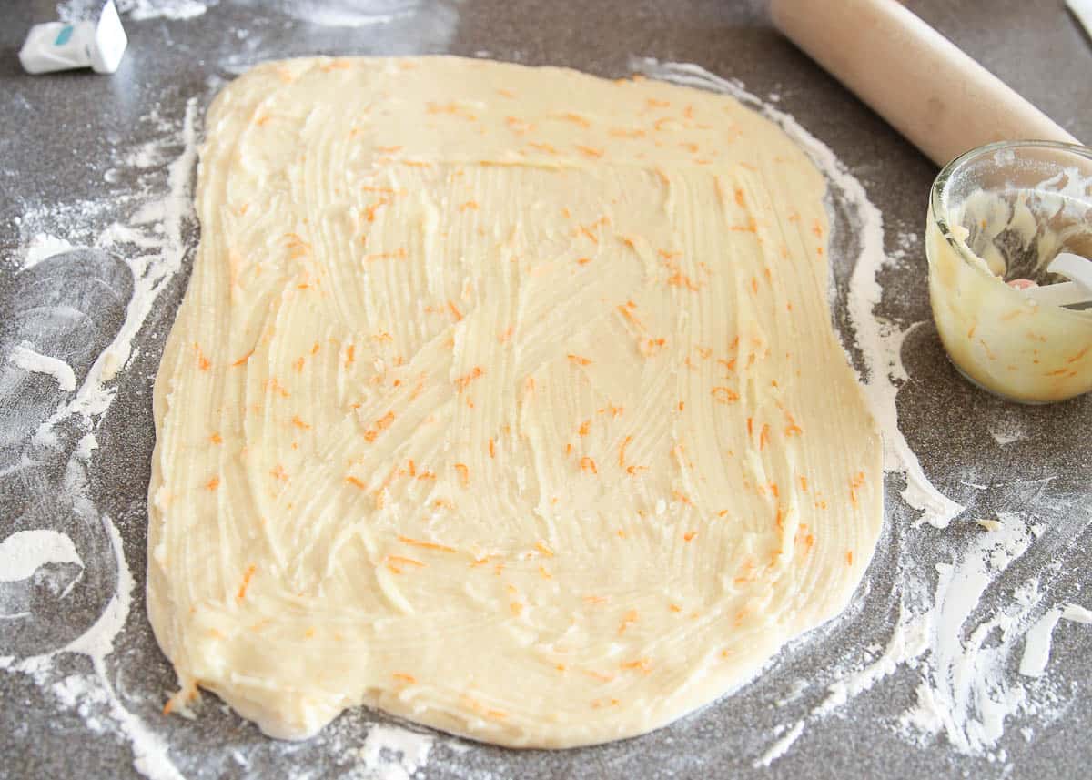orange roll dough on counter