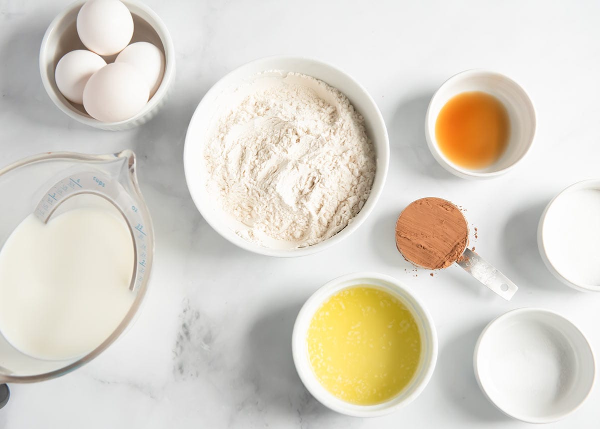 Chocolate crepe ingredients on the counter.