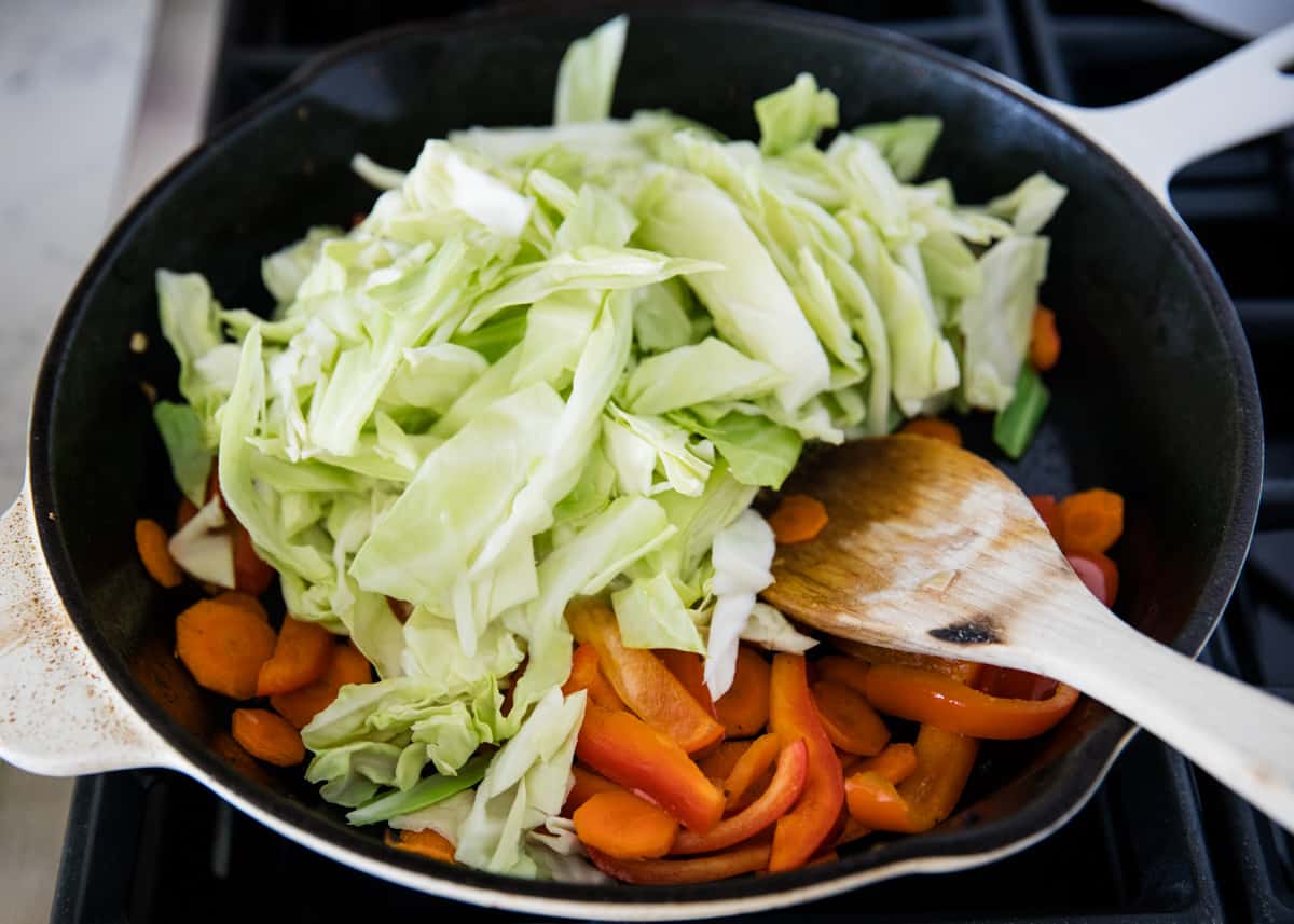 Cabbage cooking in skillet.