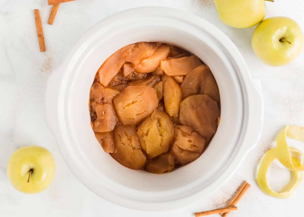 Cooked apples in crockpot.