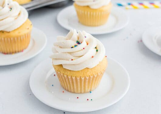 vanilla cupcake on white plate