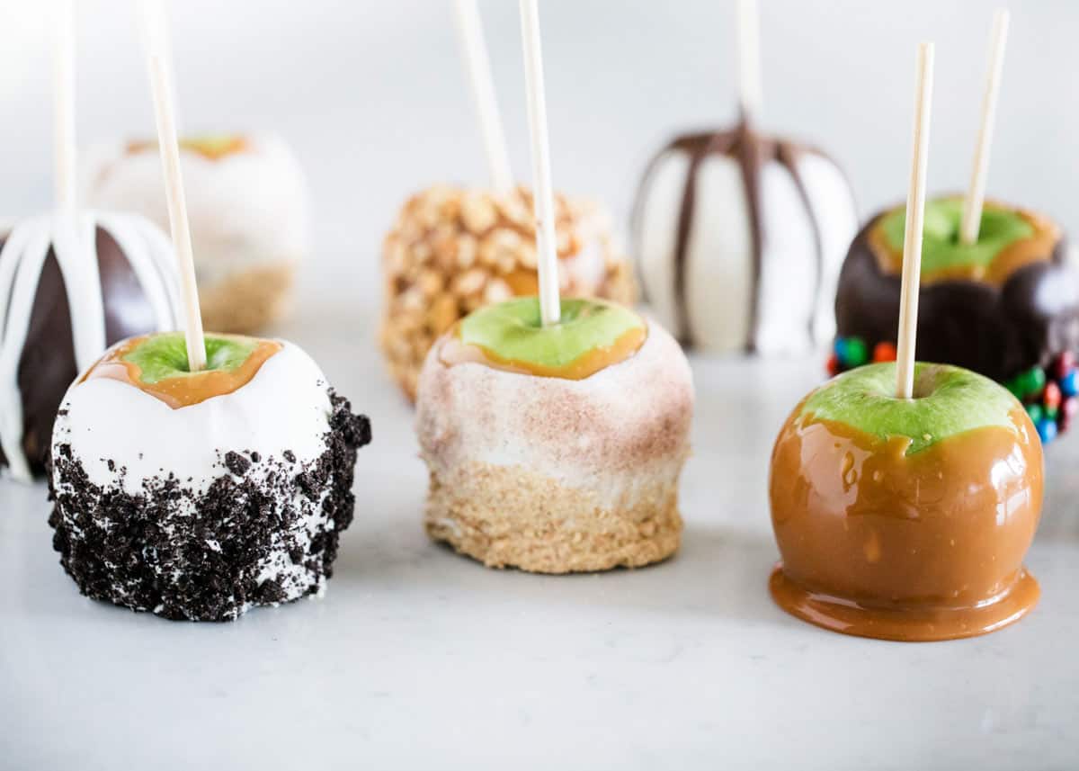 Homemade caramel apples on the counter.
