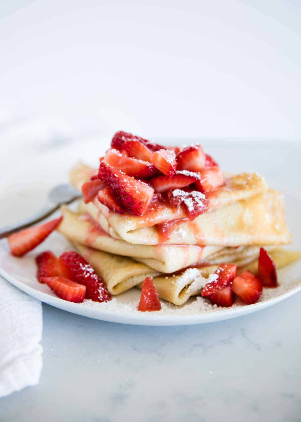 Stack of strawberry crepes. 